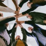 Leveraging Team Synergy to Resolve Workplace Conflicts