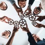 Mediation for Addressing Cross-Team Dependency Conflicts