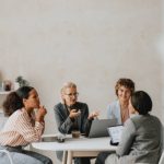 Mediation for Resetting Dynamics in Recently Merged Teams